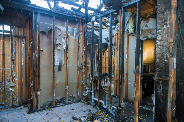 Professional Emergency Fire Damage Restoration technician working in Glen Gardner, NJ